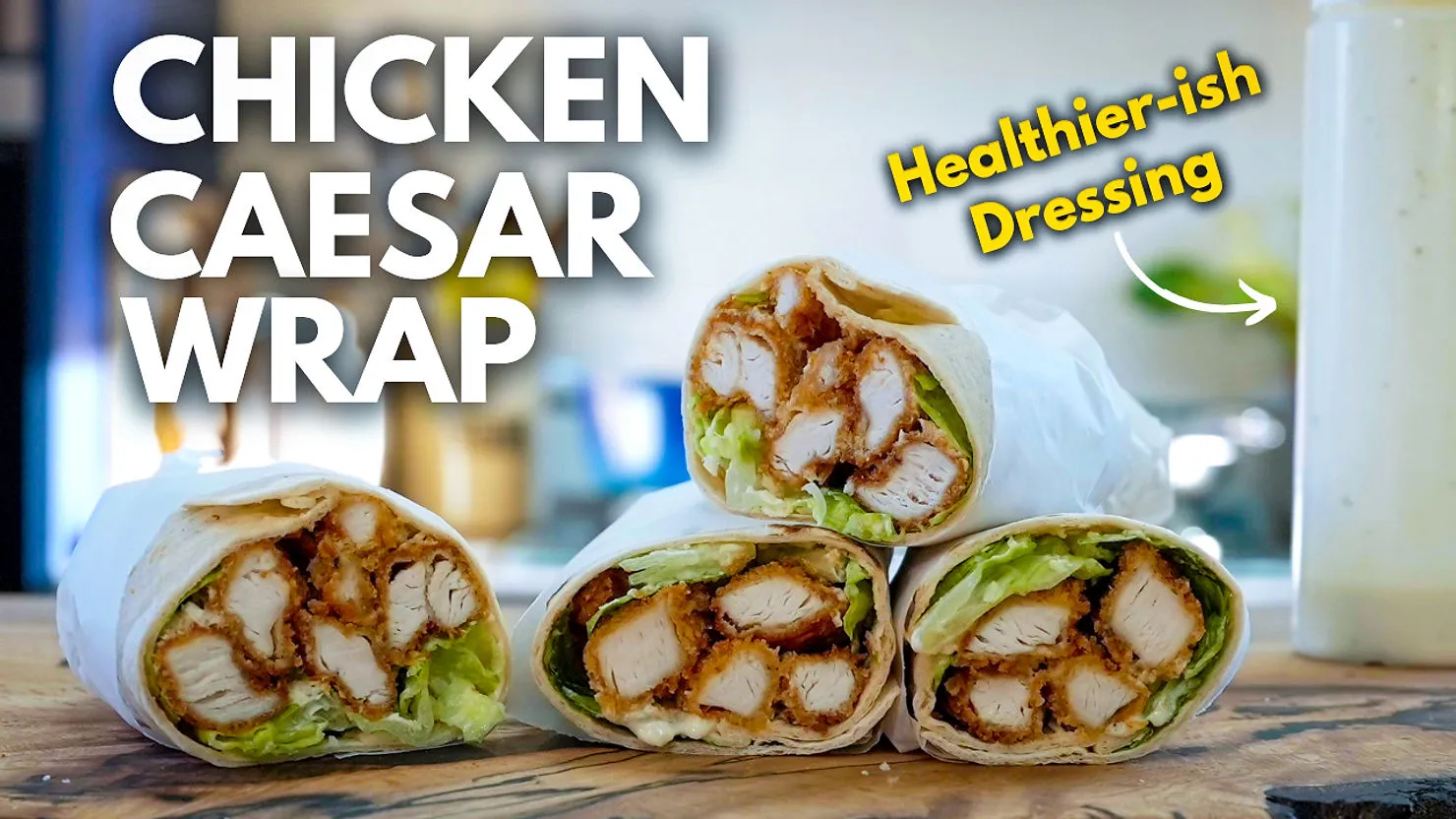 Chicken Caesar wraps with crispy chicken and lettuce on a wooden table. Text: "CHICKEN CAESAR WRAP" and "Healthier-ish Dressing".